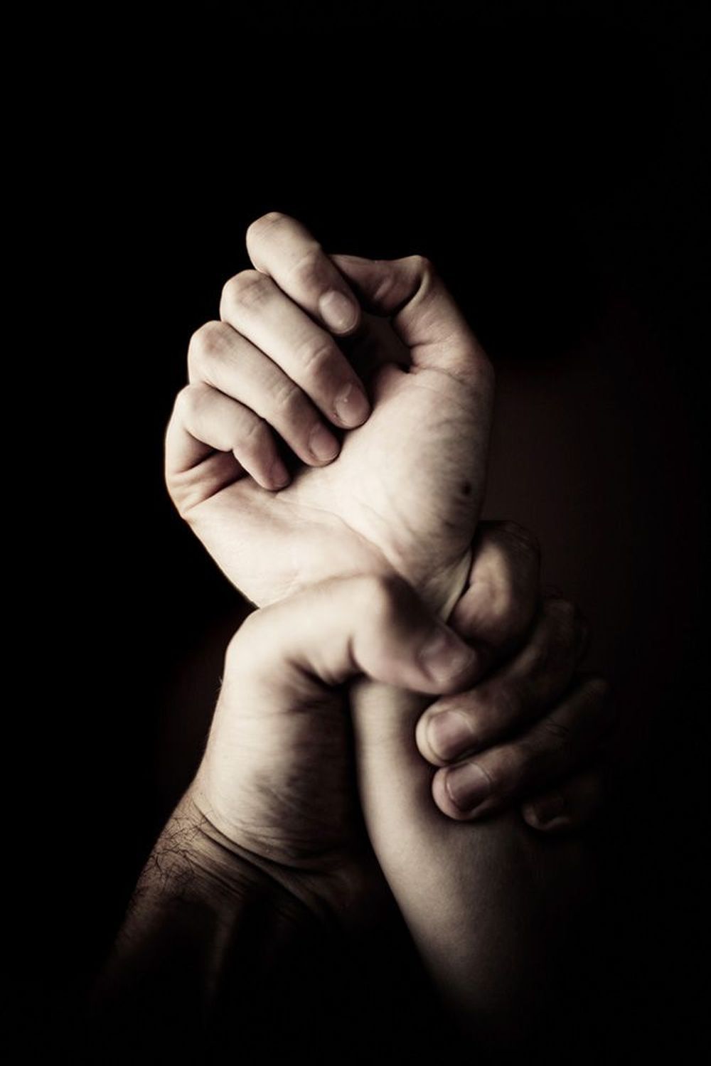 Hand closed around fist